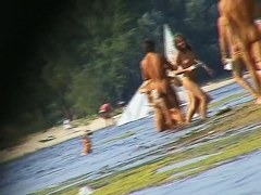 Nude beach spy camera with a sexy couple in focus