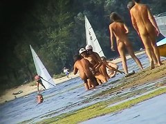 Nude beach spy camera with a sexy couple in focus