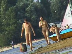 Nude beach spy camera with a sexy couple in focus