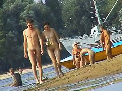 Nude beach spy camera with a sexy couple in focus