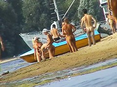 Nude beach spy camera with a sexy couple in focus