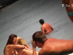 Catching nude and topless girls on spy cam on the beach