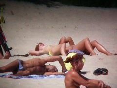Huge tits on a skinny girl in this beach cam compilation