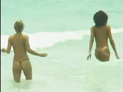 Hot nude woman having fun on a hot beach video