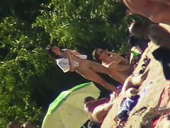 Nude beach voyeur shoots a hot babe with a hidden cam