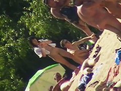 Nude beach voyeur shoots a hot babe with a hidden cam