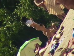 Nude beach voyeur shoots a hot babe with a hidden cam