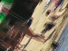 Nude beach voyeur shoots a hot babe with a hidden cam