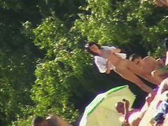 Nude beach voyeur shoots a hot babe with a hidden cam