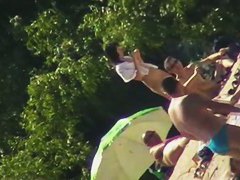 Nude beach voyeur shoots a hot babe with a hidden cam