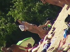 Nude beach voyeur shoots a hot babe with a hidden cam