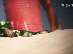 Two naked girls get their cute butts on beach voyeur camera