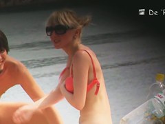 Hot girls from nudist beach shake their candid tits