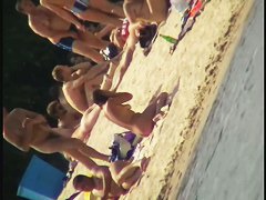 Nude beach voyeur film making extravaganza with hoes on the phone