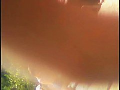 Nude beach voyeur film making extravaganza with hoes on the phone