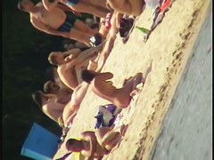 Nude beach voyeur film making extravaganza with hoes on the phone