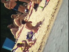 Nude beach voyeur film making extravaganza with hoes on the phone