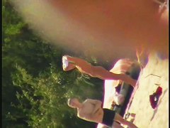 Nude beach voyeur film making extravaganza with hoes on the phone