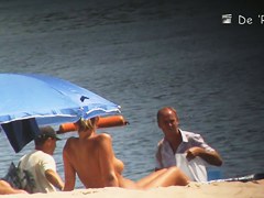 Voyeur webcam catches amateurs nude and half nude on beach