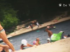 Beach couple making out nude while being voyeur taped