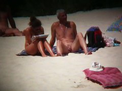 Sexy babes at the beach are playing on camera