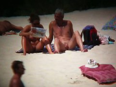 Sexy babes at the beach are playing on camera
