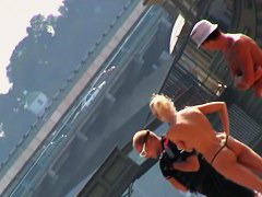 She is talking to a guy with no bra on her titties