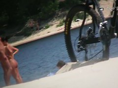 Boobs and asses of mature nudist women shots by beach voyeur