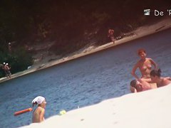 Boobs and asses of mature nudist women shots by beach voyeur