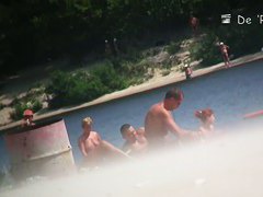 Boobs and asses of mature nudist women shots by beach voyeur