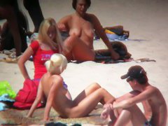 Smoking hot blonde on hidden beach cam