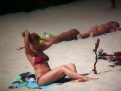 Nudist beach voyeur shoots naked babes sunbathing