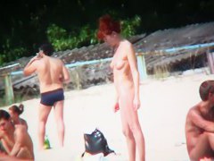 Nudist beach voyeur shoots naked babes sunbathing