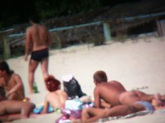 Nudist beach voyeur shoots naked babes sunbathing