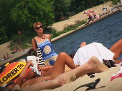 Shaved pussy spread on the beach hidden camera