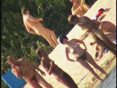 Exciting beach voyeur videos with naked mature babes