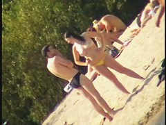 Exciting beach voyeur videos with naked mature babes