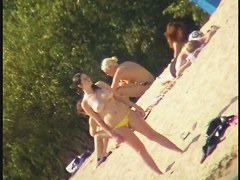 Exciting beach voyeur videos with naked mature babes