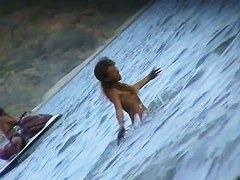 Curvy  babes filmed on a nude beach