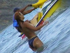 Curvy  babes filmed on a nude beach