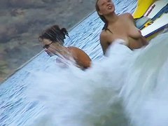Curvy  babes filmed on a nude beach