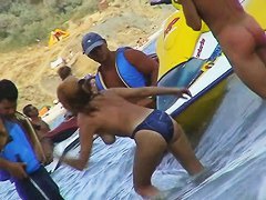 Curvy  babes filmed on a nude beach