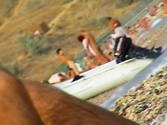 Naked amateur staying in water on beach voyeur hunter