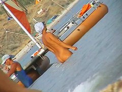 Naked amateur staying in water on beach voyeur hunter