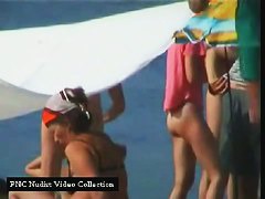 Splendid naked babes with shaved pussies at the beach
