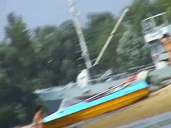 Hot beach voyeur video shows mature nudists enjoying each others company.