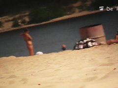 The candid tits view of pretty girls sunbathing topless