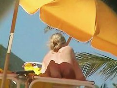 Sexy chicks are being filmed on the beach