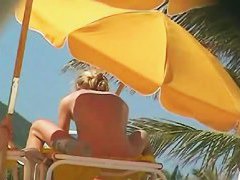 Sexy chicks are being filmed on the beach