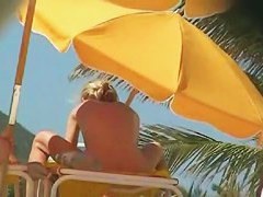 Sexy chicks are being filmed on the beach